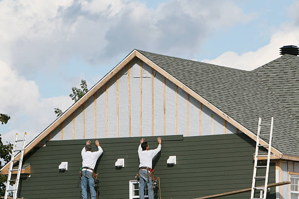 Professional Siding technician working in Balm, FL